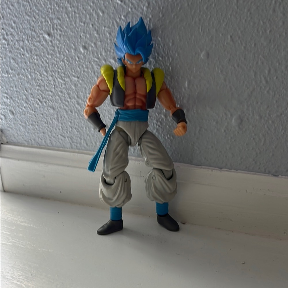Action Figure with Blue Hair and Yellow Accents